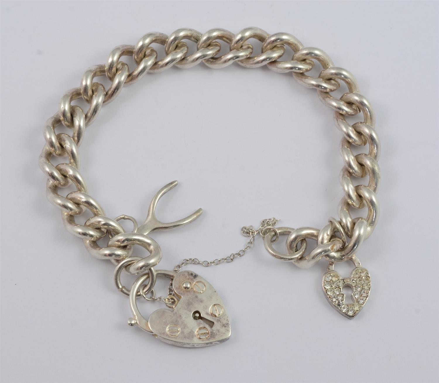 Appraisal: Sterling silver charm bracelet charms padlock catch TO