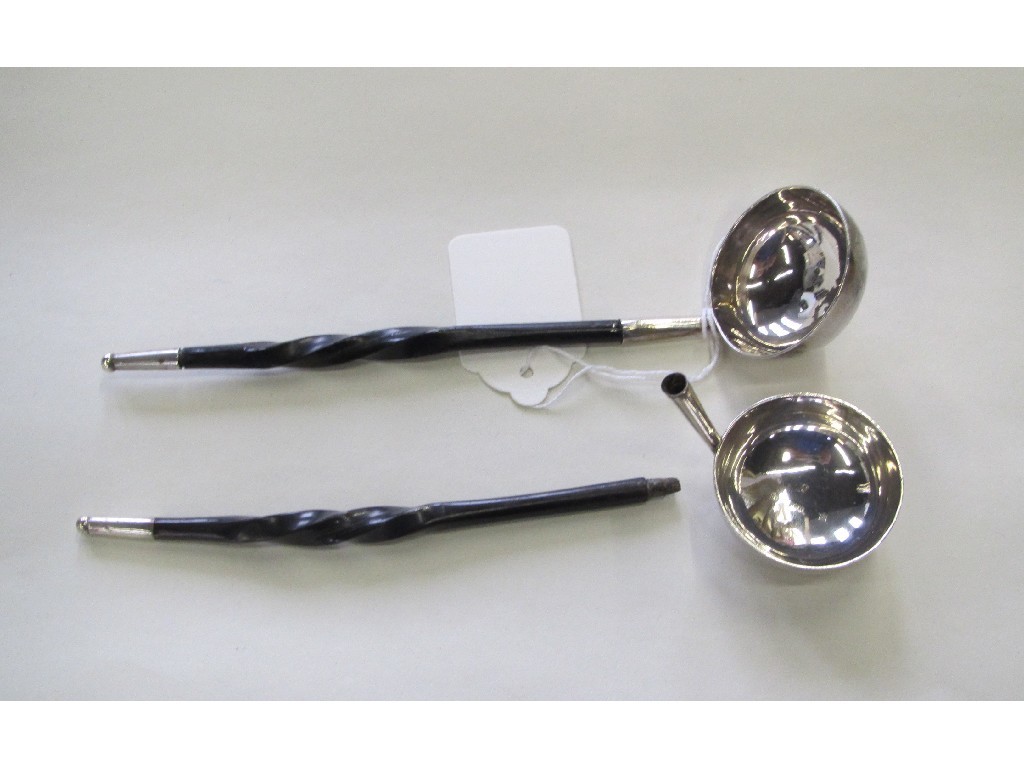 Appraisal: Pair of silver and ebony toddy ladles one def Glasgow