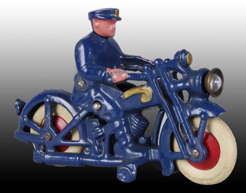 Appraisal: Cast Iron Hubley Toy Motorcycle Description Policeman rider White rubber