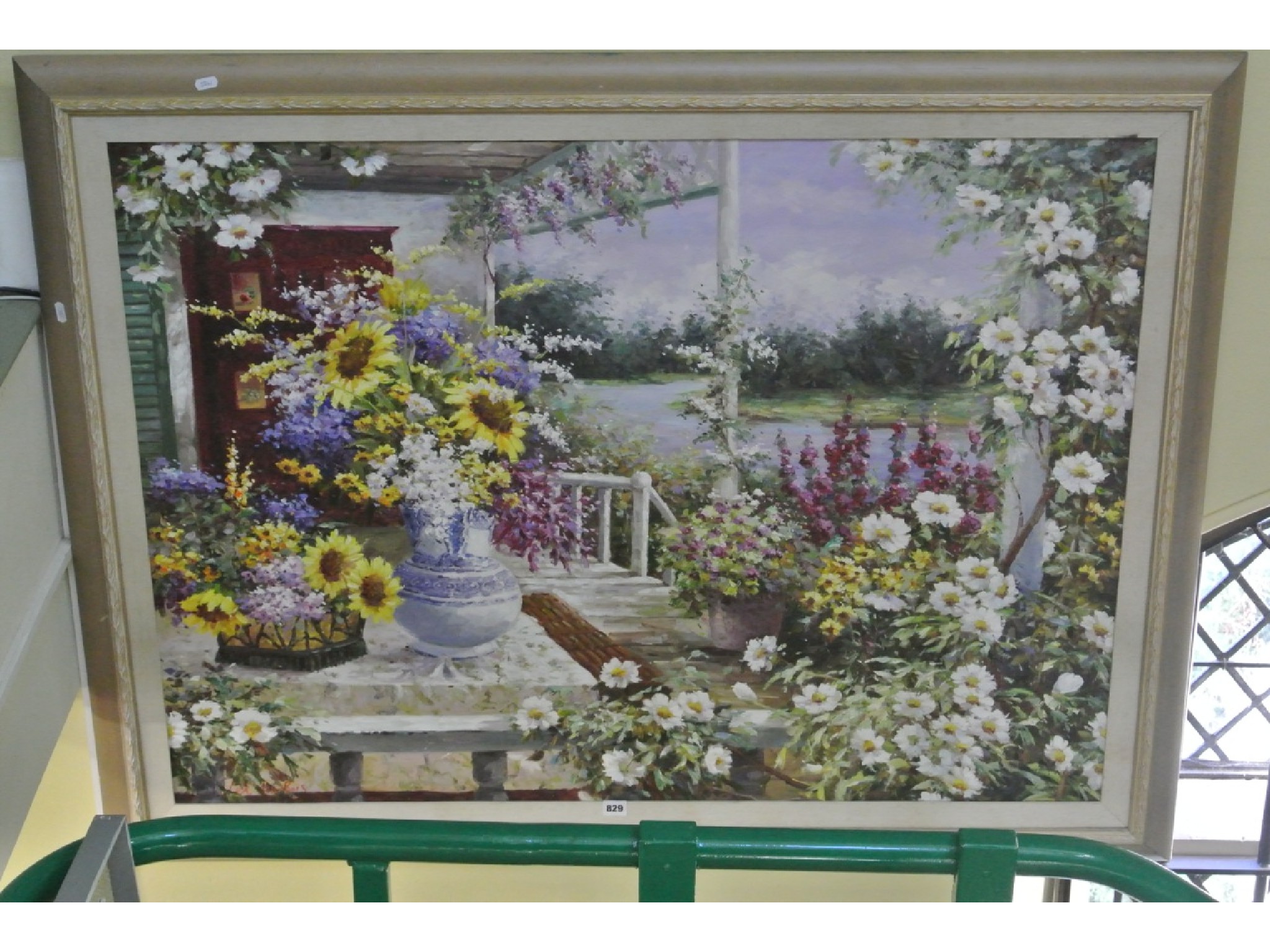 Appraisal: A large oil painting on canvas of a flower decked