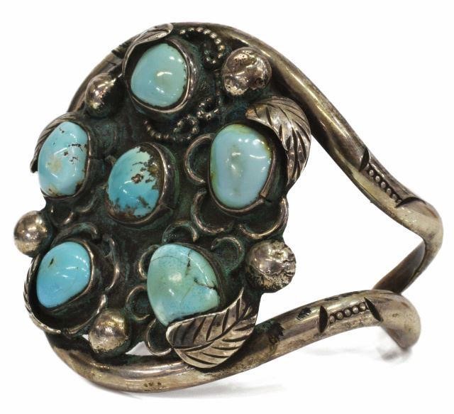 Appraisal: Southwest silver content unknown cuff bracelet with six turquoise cabochons