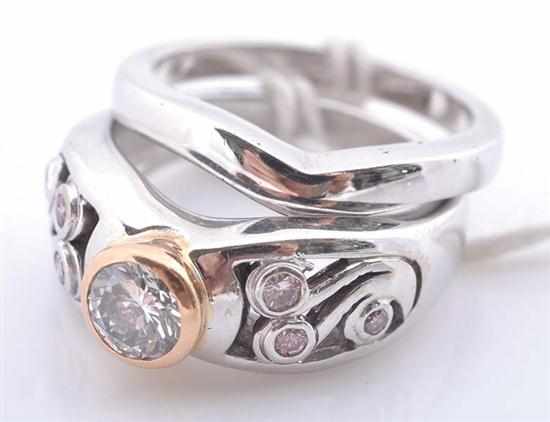 Appraisal: A PINK AND WHITE DIAMOND RING- Centrally set with a