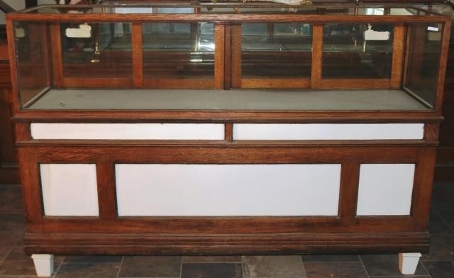 Appraisal: CA OAK COUNTRY STORE DISPLAY CABINET WITHWHITE ENAMEL PANELS AND