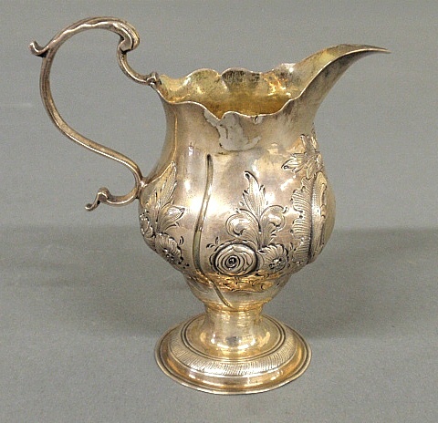 Appraisal: - Delicate English repouss silver creamer c engraved with an