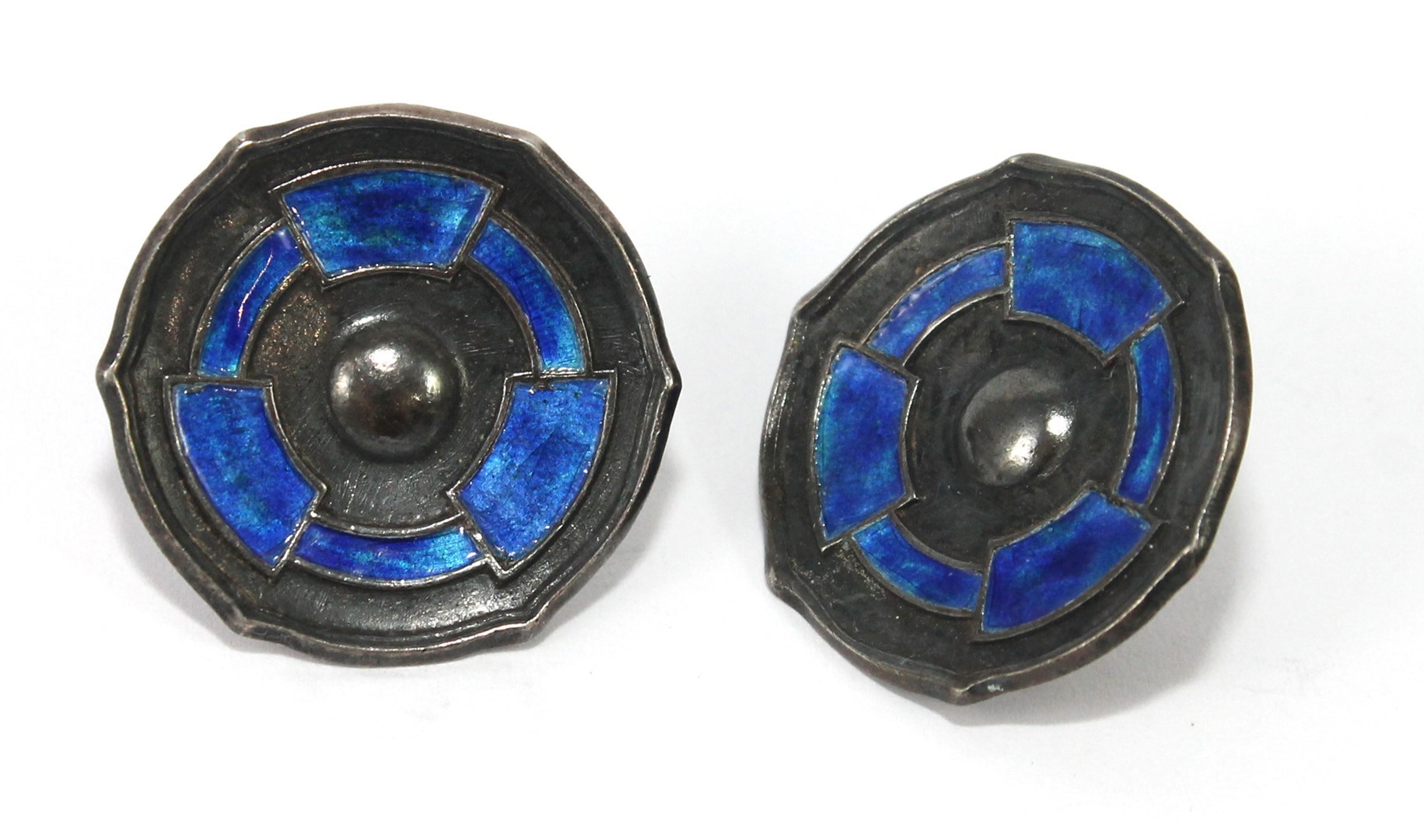 Appraisal: A pair of silver and blue enameled earstuds each of