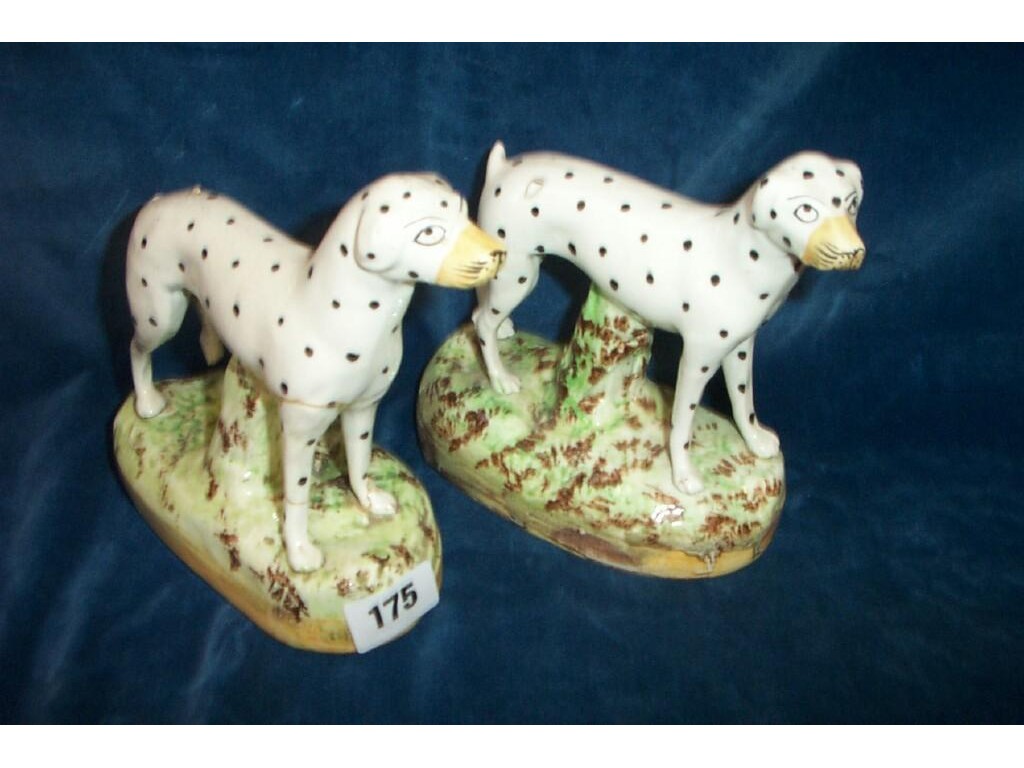 Appraisal: A pair of th century Staffordshire models of standing Dalmatians