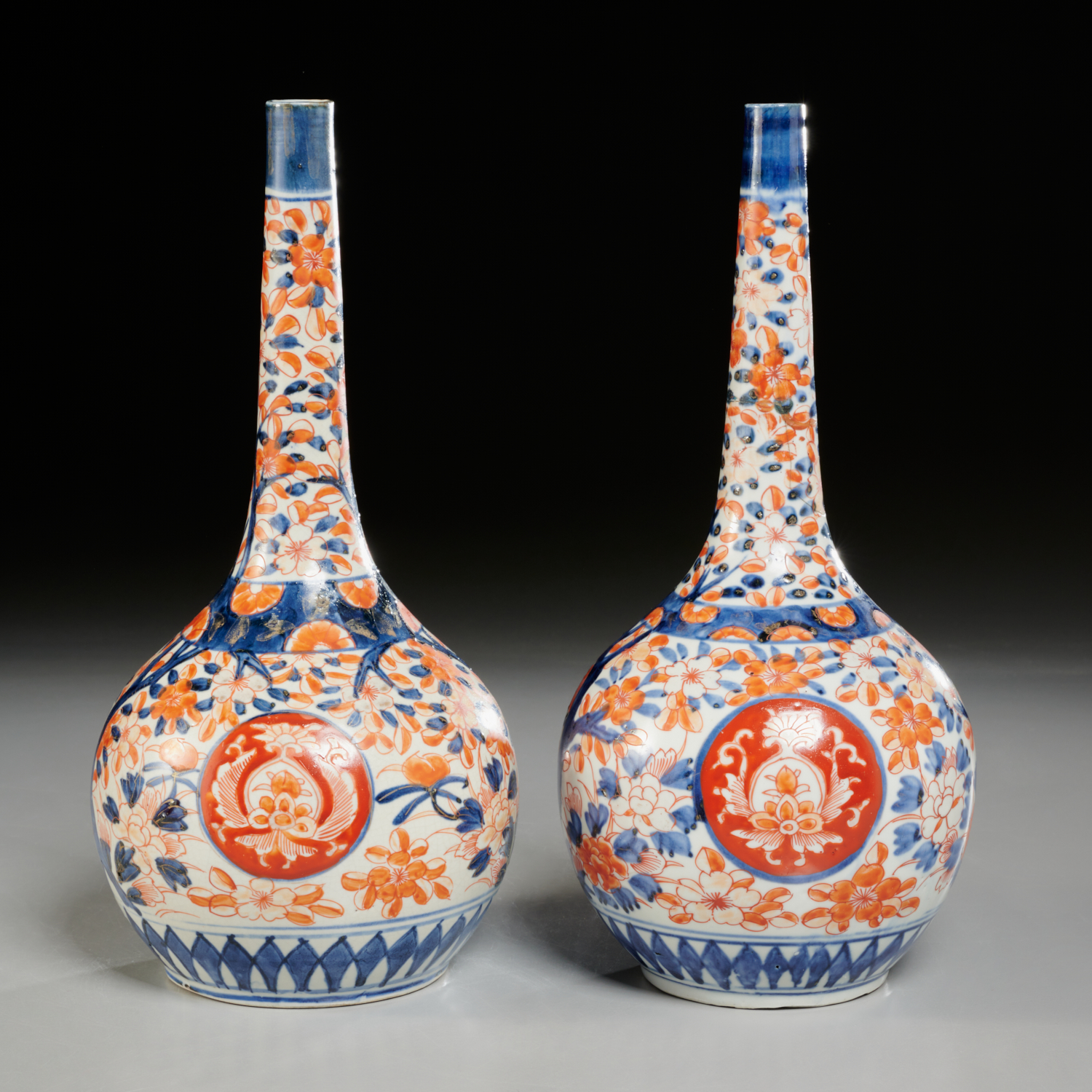 Appraisal: PAIR IMARI PORCELAIN BOTTLE VASES EX CHRISTIES Likely Edo Period