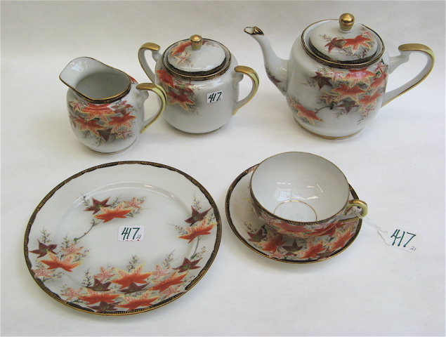 Appraisal: JAPANESE PORCELAIN TEA SET pieces decorated with autumn colored leaves