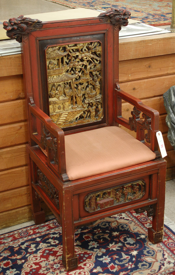 Appraisal: MING-STYLE CARVED AND RED STAINED WOOD ARMCHAIR Chinese late th