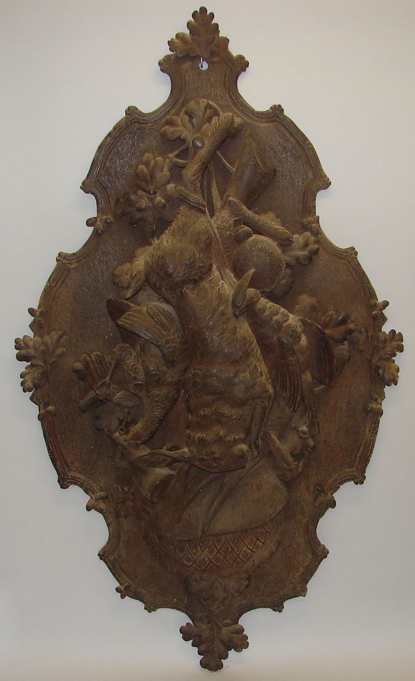 Appraisal: Carved plaque features hunt motif with rabbit quail grouse and