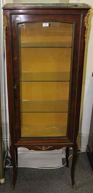 Appraisal: A FRENCH ROSEWOOD DISPLAY CABINET enclosed by single glazed panel