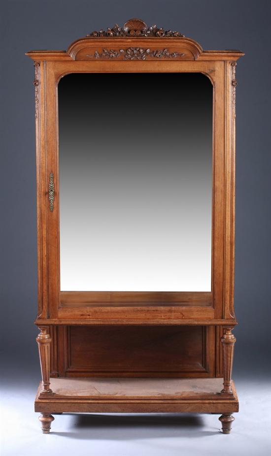 Appraisal: LOUIS XVI STYLE PROVINCIAL CARVED FRUITWOOD VITRINE th century with