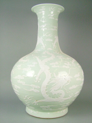 Appraisal: Large Chinese celadon vase of baluster form decorated with white