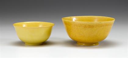 Appraisal: Two Chinese Imperial yellow monochrome bowls th century and possibly