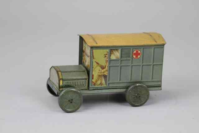 Appraisal: AMBULANCE FIGURAL BISCUIT TIN England c lithographed tinplate in gray