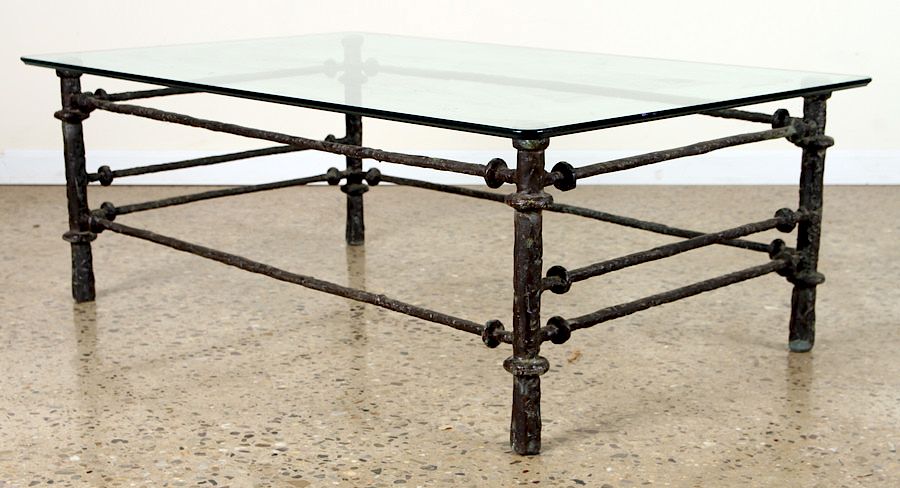 Appraisal: IRON COFFEE TABLE MANNER OF DIEGO GIACOMETTI An iron coffee