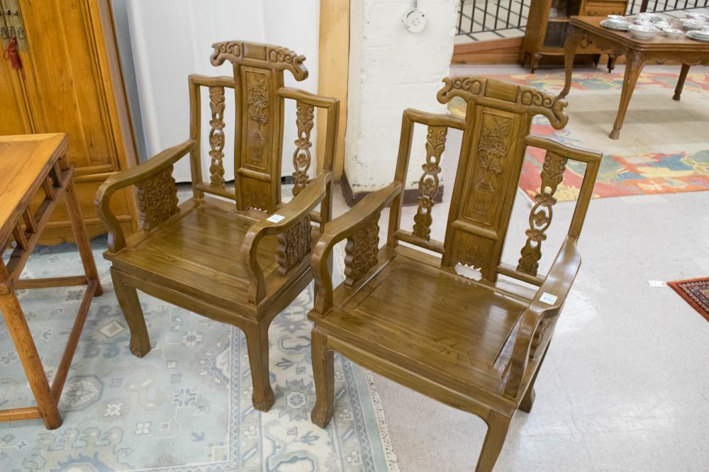 Appraisal: PAIR OF CHINESE MING-STYLE ARMCHAIRS of relief-carved elm wood with