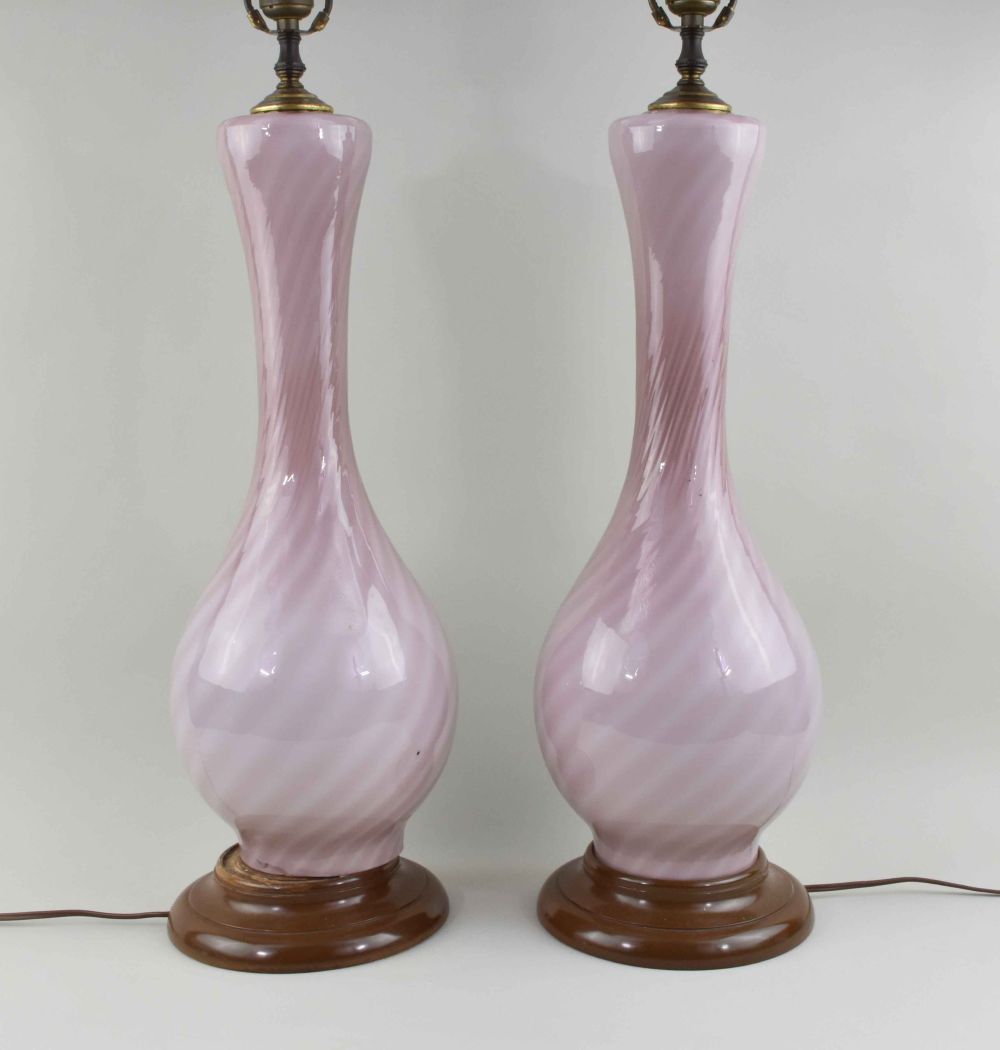 Appraisal: PAIR OF BALUSTER FORM AMETHYST WHITE HUED GLASS LAMPSModern possibly