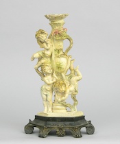 Appraisal: A Cast Painted Gesso Candlestick A cast and painted gesso