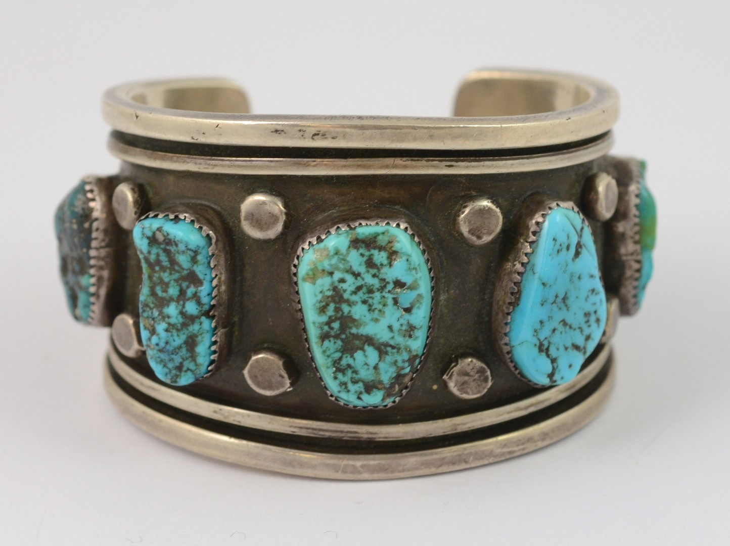 Appraisal: Navajo sterling cuff bracelet set with turquoise stones marked W