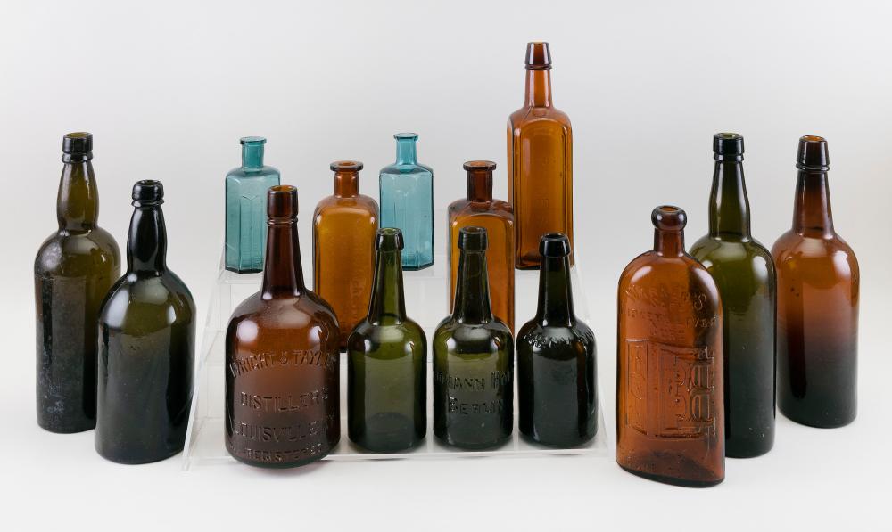 Appraisal: FOURTEEN BLOWN-MOLDED GLASS BOTTLES TH EARLY TH CENTURY HEIGHTS FROM