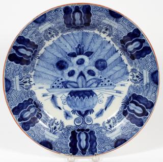 Appraisal: A DUTCH DELFT BLUE AND WHITE CHARGER A DUTCH DELFT