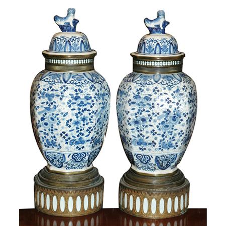 Appraisal: Pair of Dutch Delft Style Porcelain Covered Vases Estimate -