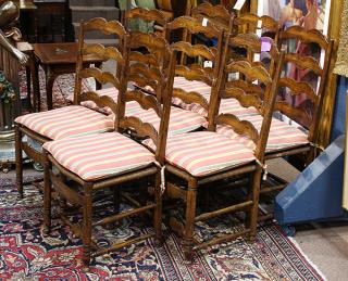 Appraisal: Eight French Provincial style dining chairs circa executed in walnut