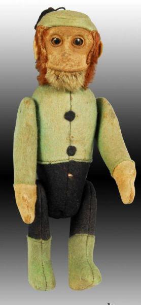 Appraisal: Schuco Green Monkey Bottle Description Screw type head Glass eyes