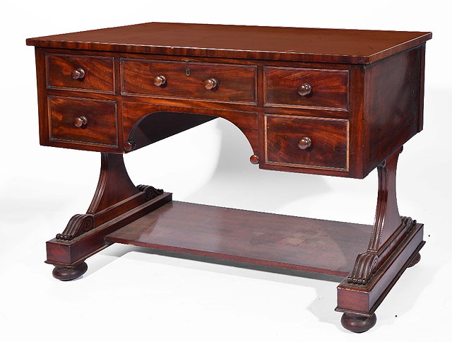 Appraisal: William IV mahogany writing tablefitted five drawers on reeded supports