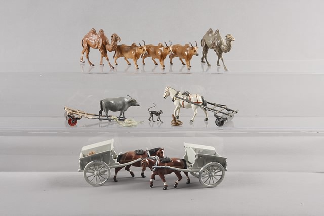 Appraisal: Lot of horse-drawn farm implements with animals mostly Britains Estimated