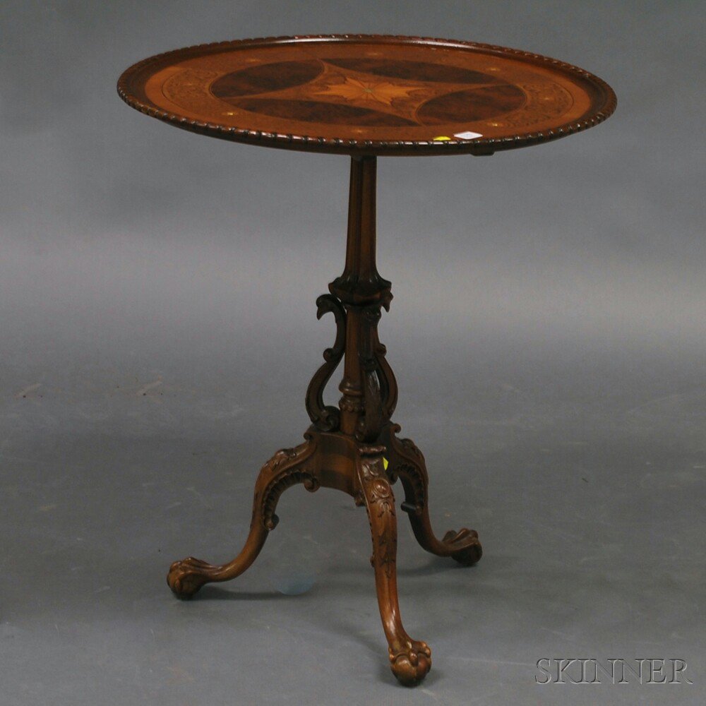 Appraisal: Chippendale-style Carved Parquetry Tilt-top Tea Table the top with mother-of-pearl