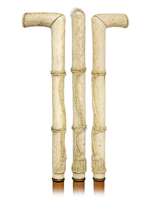 Appraisal: Bone Dress Cane -Ca -L-shaped bone handle with an impressively