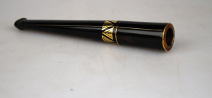 Appraisal: A cased Cartier gold-inlaid cheroot holder