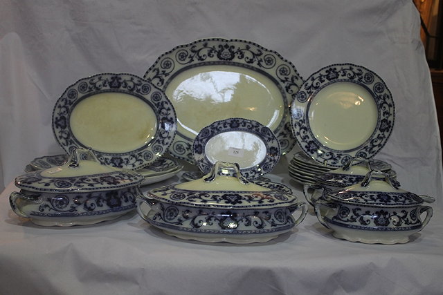 Appraisal: A VICTORIAN FLOW BLUE PART DINNER SERVICE including four tureens