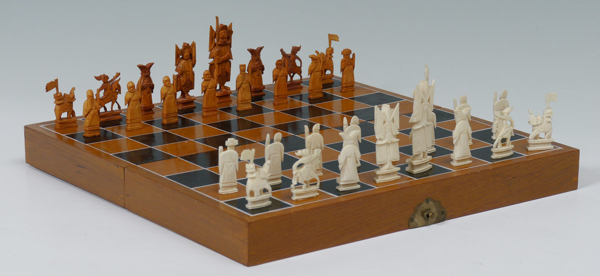 Appraisal: CARVED CHINESE IVORY CHESS SET IN CASE Complete set kings