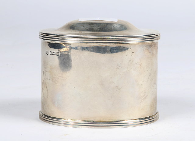 Appraisal: A GEORGE V OVAL SILVER TEA CADDY of plain form