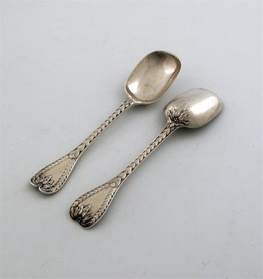 Appraisal: A pair of Victorian palm pattern sugar spoons by George