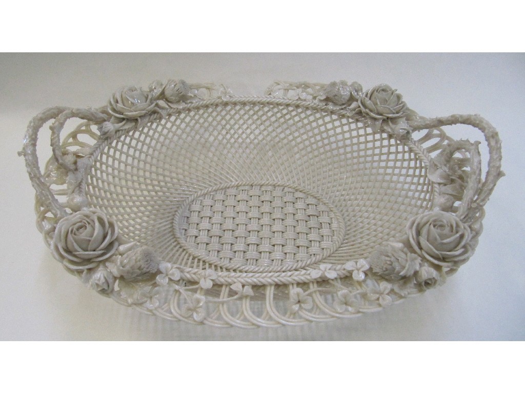 Appraisal: Belleek three strand basket with relief decoration on roses and