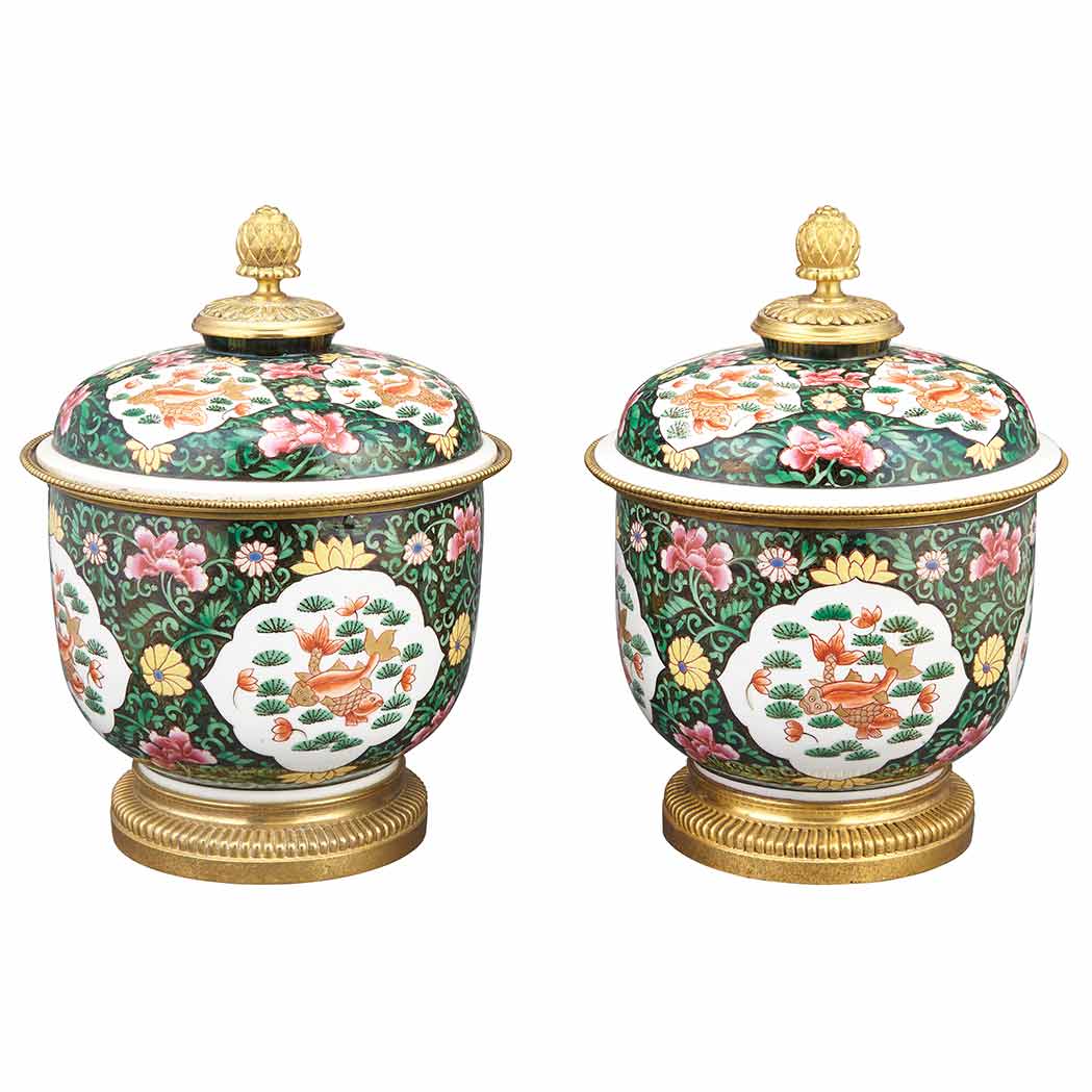 Appraisal: Pair of Louis XVI Style Gilt-Metal Mounted Porcelain Covered Urns