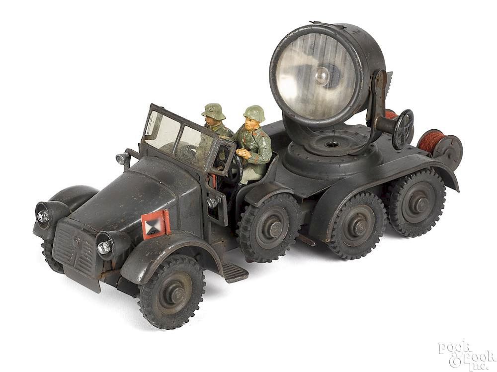 Appraisal: Hausser painted tin clockwork search light truck Hausser painted tin