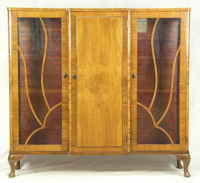 Appraisal: An Art Deco style walnut veneered bookcase circa cm wide