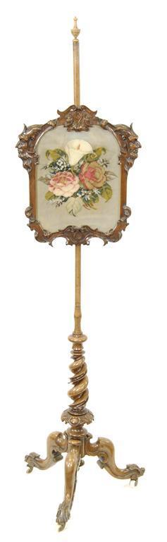 Appraisal: A Victorian walnut pole firescreen