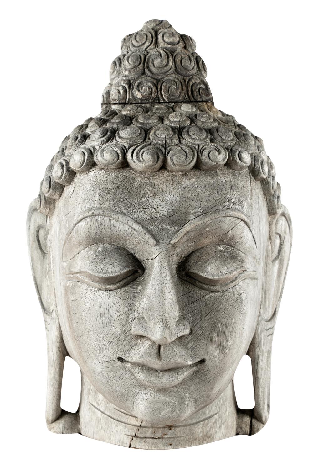 Appraisal: CARVED WOOD HEAD OF BUDDHACondition with splits and cracks throughout