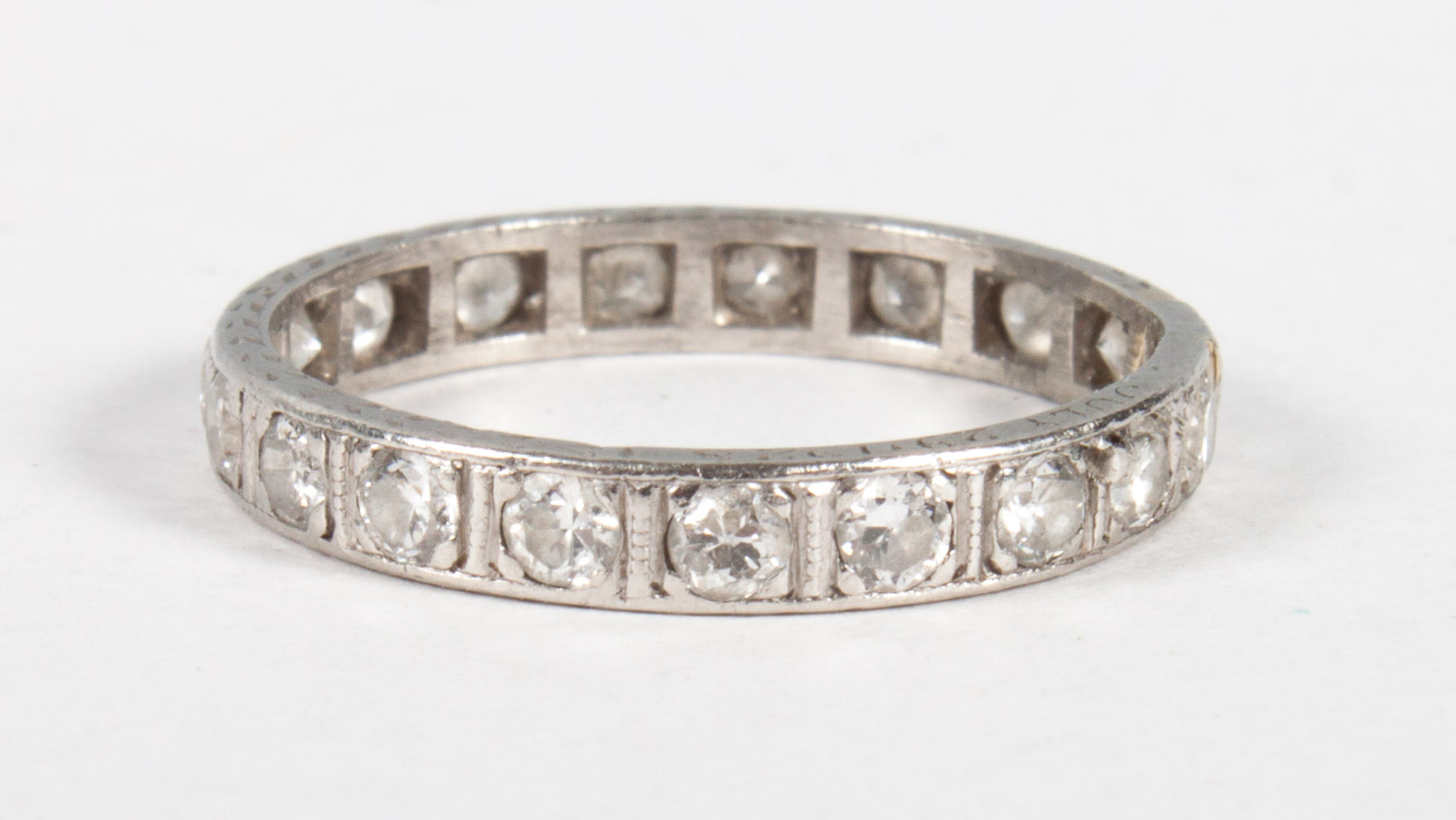 Appraisal: Platinum and diamond eternity band about mm wide size grams