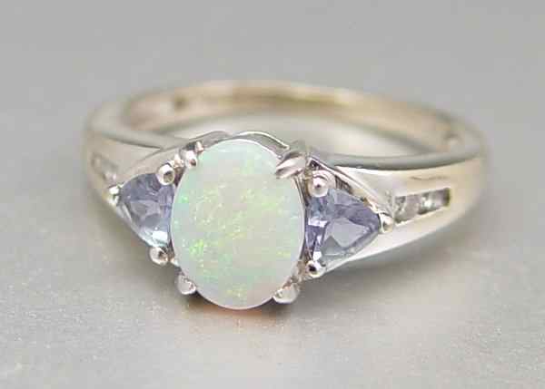 Appraisal: K OPAL TANZANITE AND DIAMOND RING K white gold ring