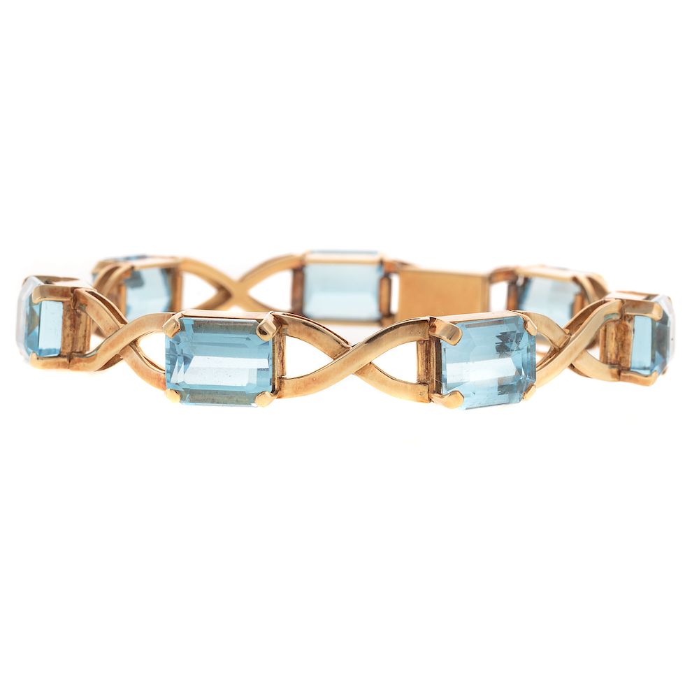 Appraisal: A Ladies Blue Topaz X Link Bracelet in K K