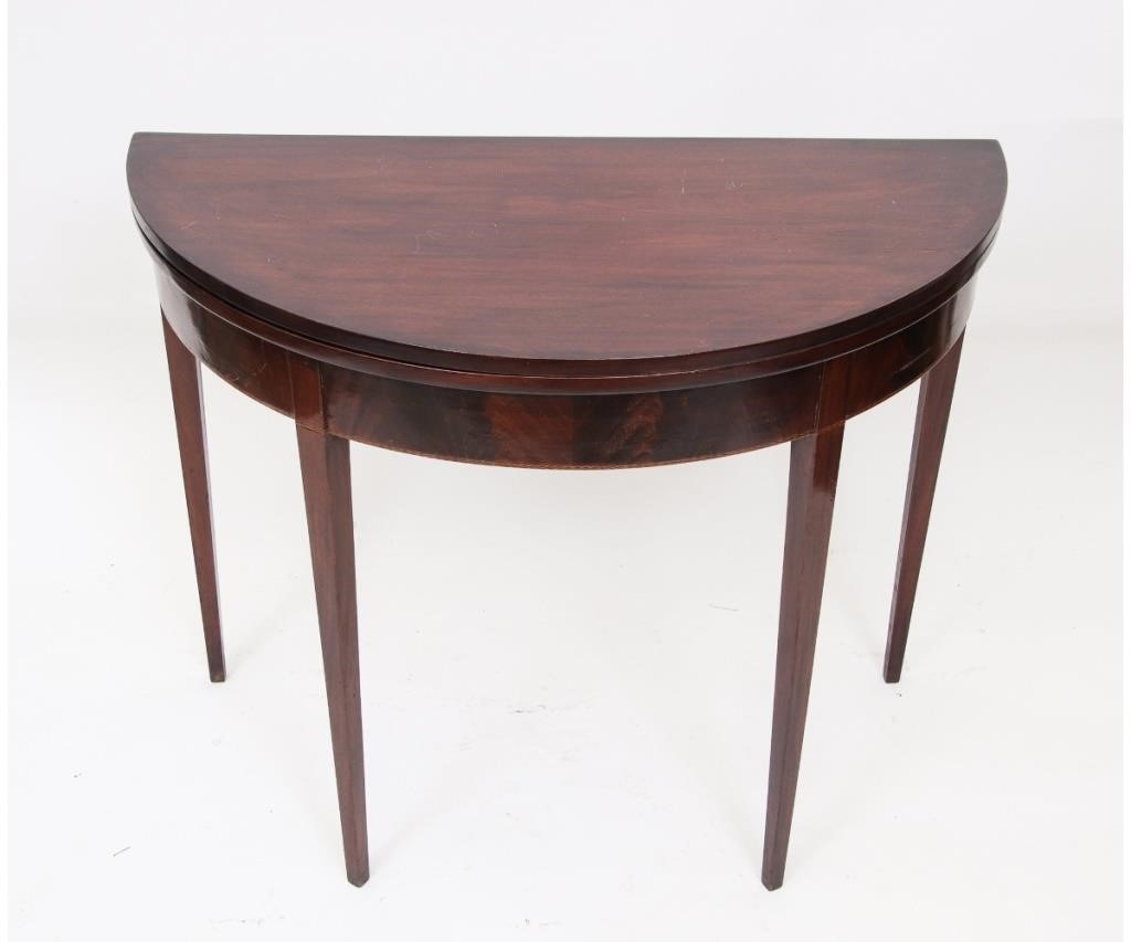 Appraisal: Hepplewhite mahogany inlaid demilune gaming table circa having delicate square