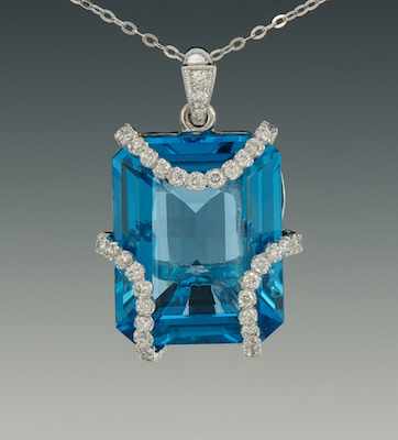 Appraisal: A Ladies' Topaz and Diamond Pendant on Chain by Eli