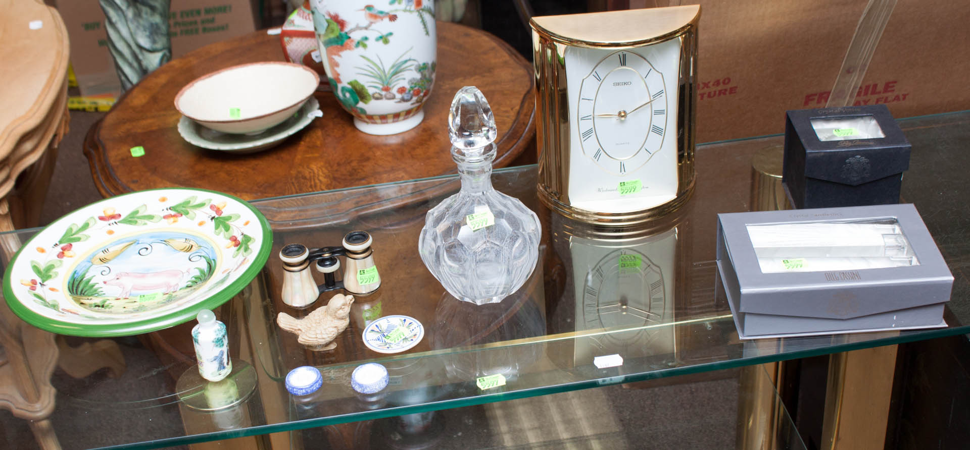 Appraisal: Assortment of decorative items including Seiko clock Oleg Cassini glass